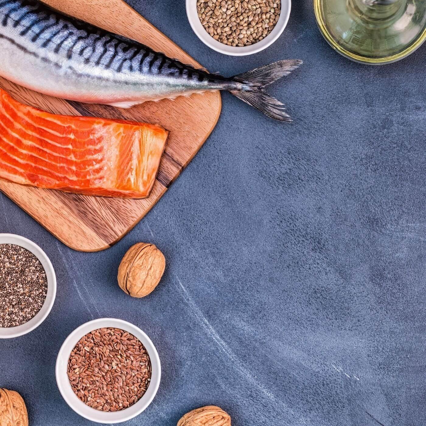 Display of omega 3 sources on a dark background